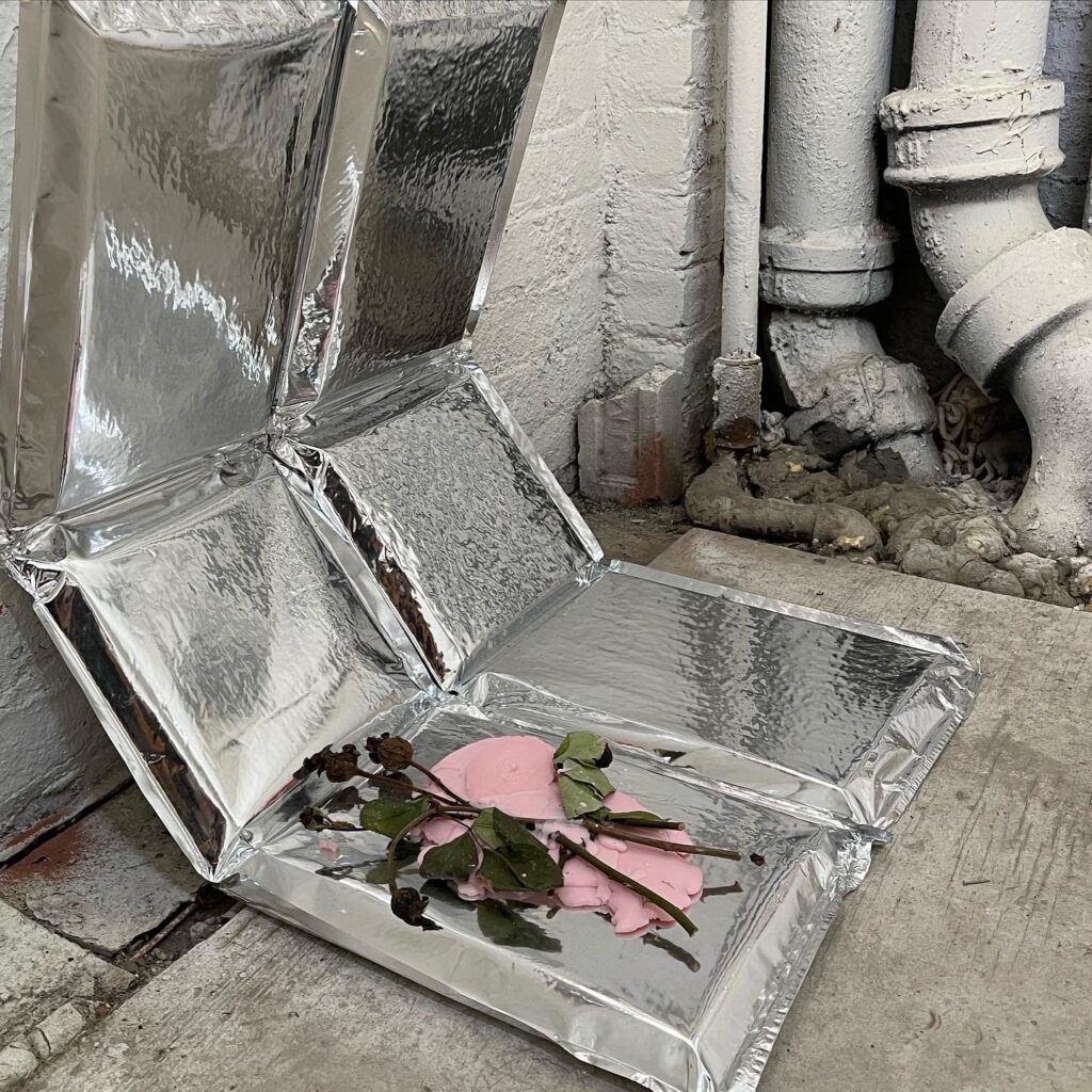 Cruising in a rose garden, (2022), soap, essential oils, rose plants, aluminum, polyester, variable dimension installation - presented at Petty Cash (NYC)